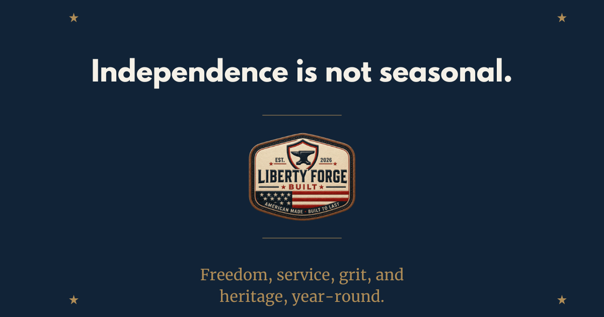 Navy Liberty Forge Built graphic reading "Independence is not seasonal." above the anvil badge logo, with the line "Freedom, service, grit, and heritage, year-round."