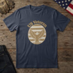 Navy t-shirt with a bald eagle badge with spread wings and the words "US Veteran", on wood with an American flag