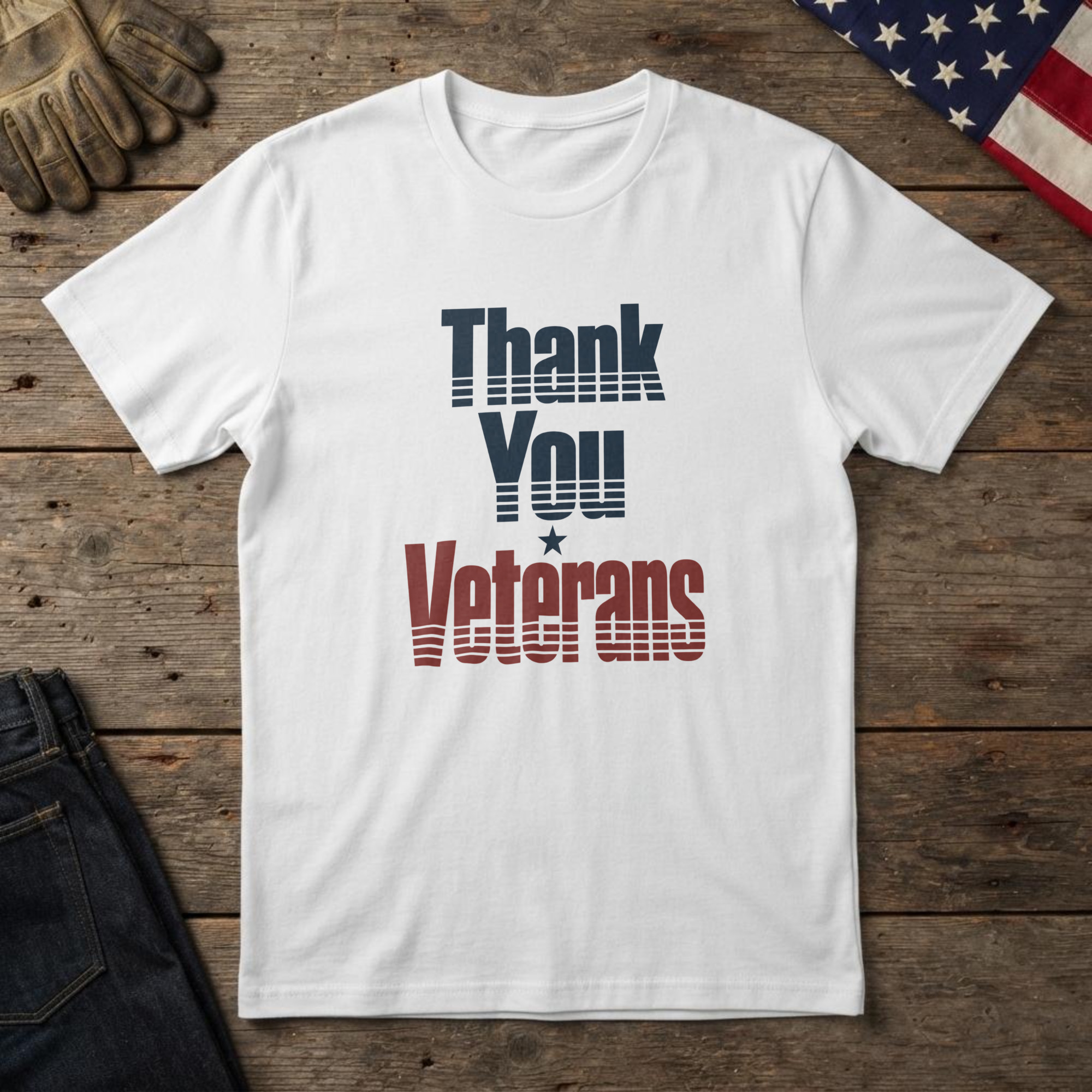 lfb-hero-13829 White t-shirt with navy and red striped type, "Thank You Veterans" and a star, on wood with a US flag