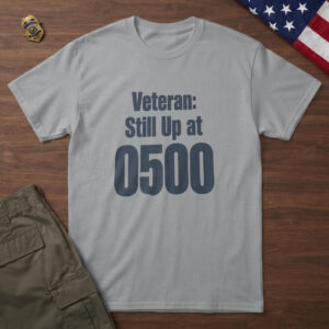 Sport Grey t-shirt with bold navy type reading "Veteran: Still Up at 0500" on wood with a US flag