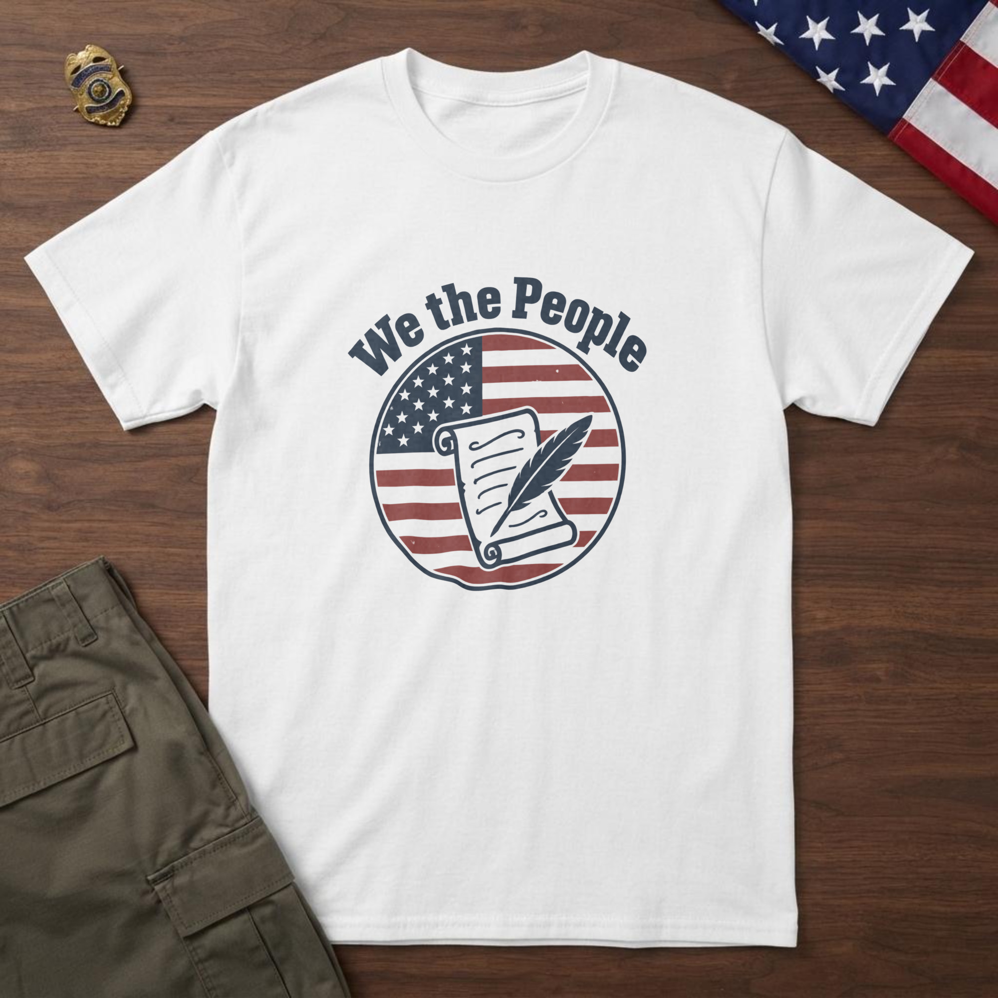 lfb-hero-14791 White t-shirt with an unrolled parchment and a quill pen on a flag-stripe badge and the words "We the People", on walnut